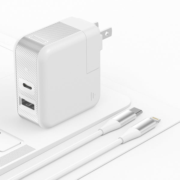 Just Wireless Phone & Laptop Charger with 6ft Lightning® to USB-C Cable - Quick and Powerful Wall Charger - Delivers 45 Watts of Power - Includes 6ft Lightning® to USB-C Cable - Dual Charge with USB-C and USB-A Ports - Supports Power Delivery (PD) - Rotating Prongs for Easy Plug Management - Features GaN Technology - Charges up to 50% in 30 Minutes with PD - Charge Your Laptop - Includes Hardshell Case